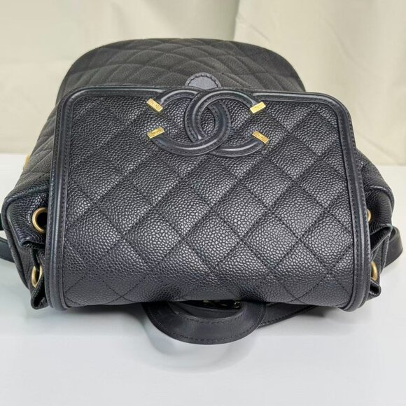 Chanel Black Caviar Filigree Backpack with Gold Accents & Quilted Design - Picture 7 of 9